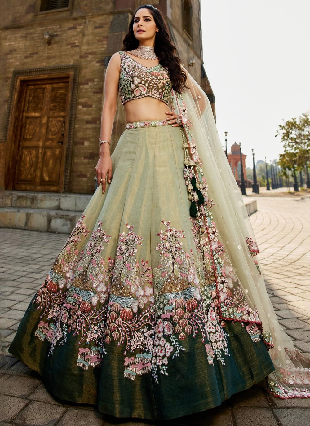 Stunning green beaded net lehenga choli for indian weddings