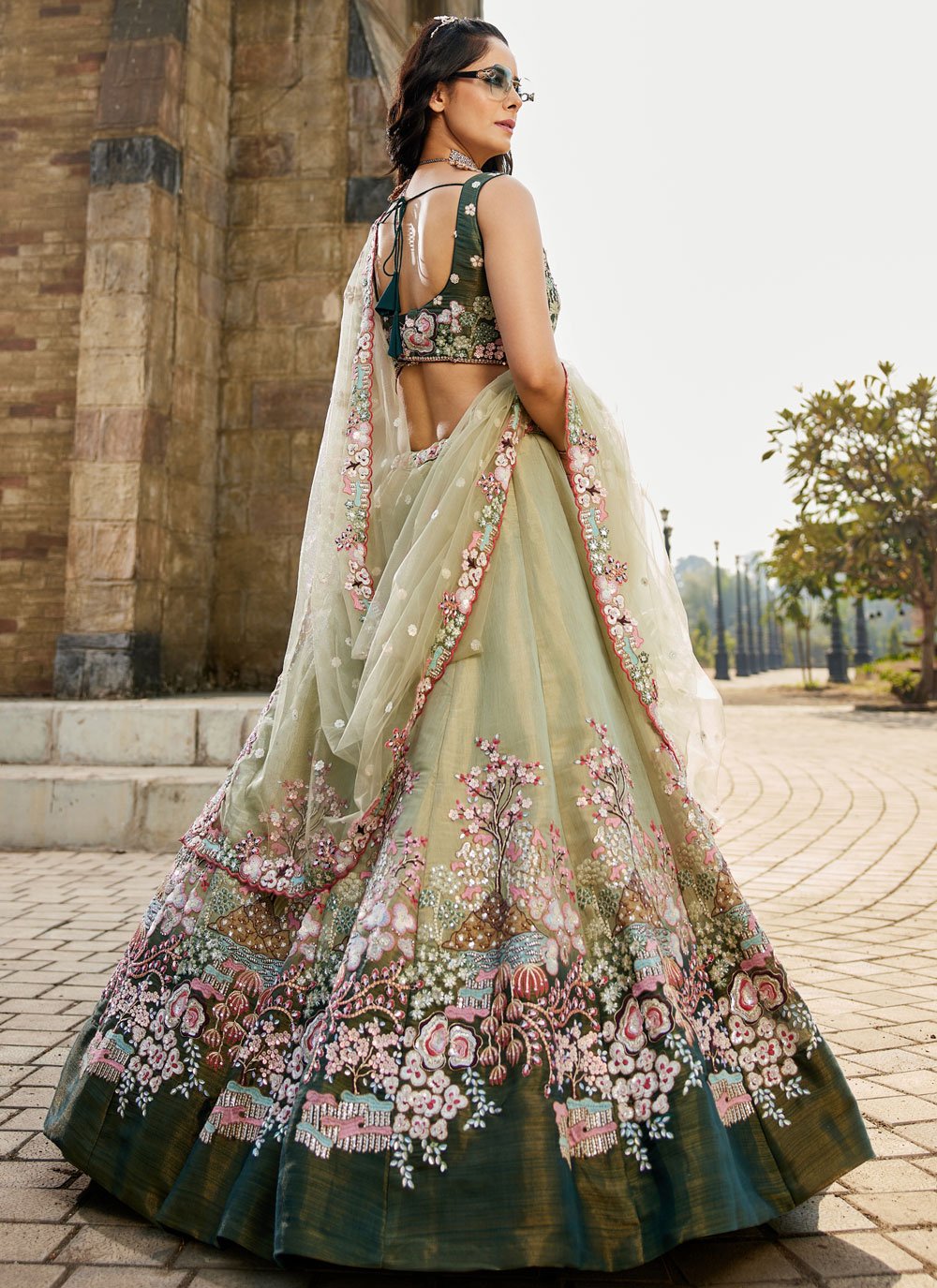 Stunning green beaded net lehenga choli for indian weddings