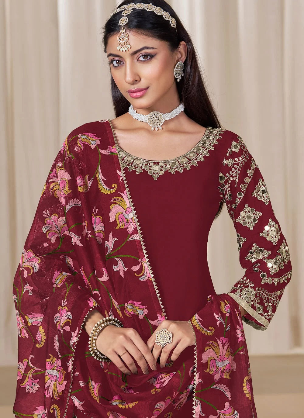 Stylish maroon mirror work punjabi suit in chanderi silk with glass embellishments