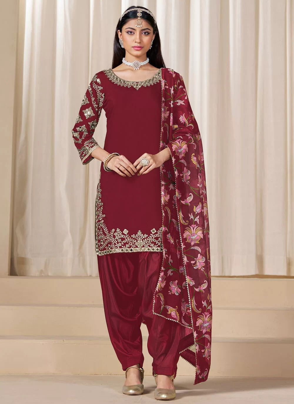 Stylish maroon mirror work punjabi suit in chanderi silk with glass embellishments