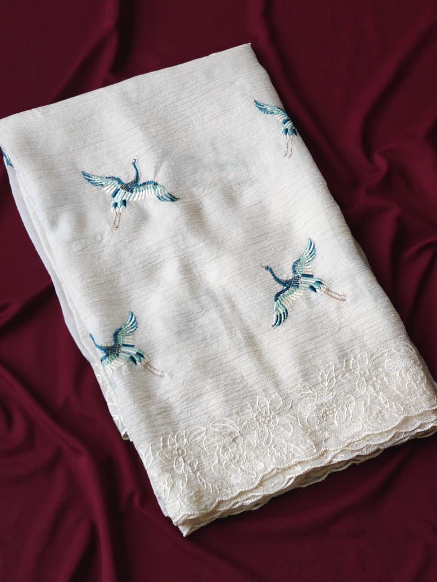 Precious Off White Embroidery Work Crush Silk Saree With Charming Blouse Piece