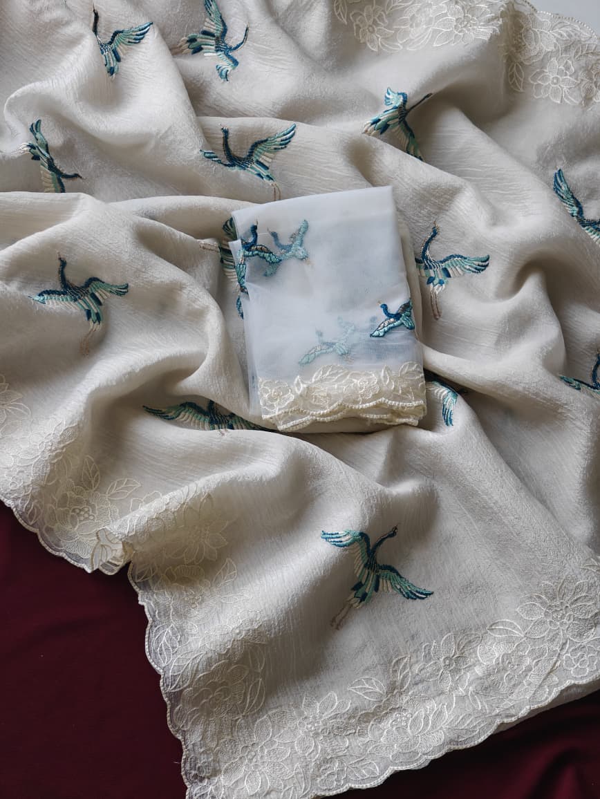 Precious Off White Embroidery Work Crush Silk Saree With Charming Blouse Piece