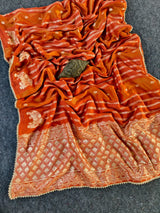 Sizzling Orange Banarasi Georgette Silk Saree With Jubilant Blouse Piece