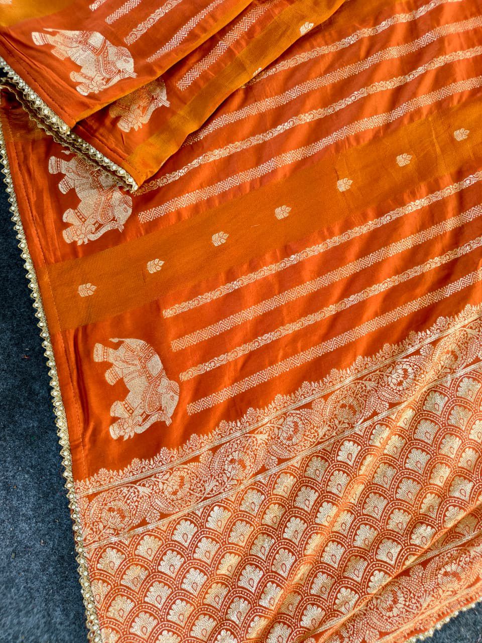 Sizzling Orange Banarasi Georgette Silk Saree With Jubilant Blouse Piece