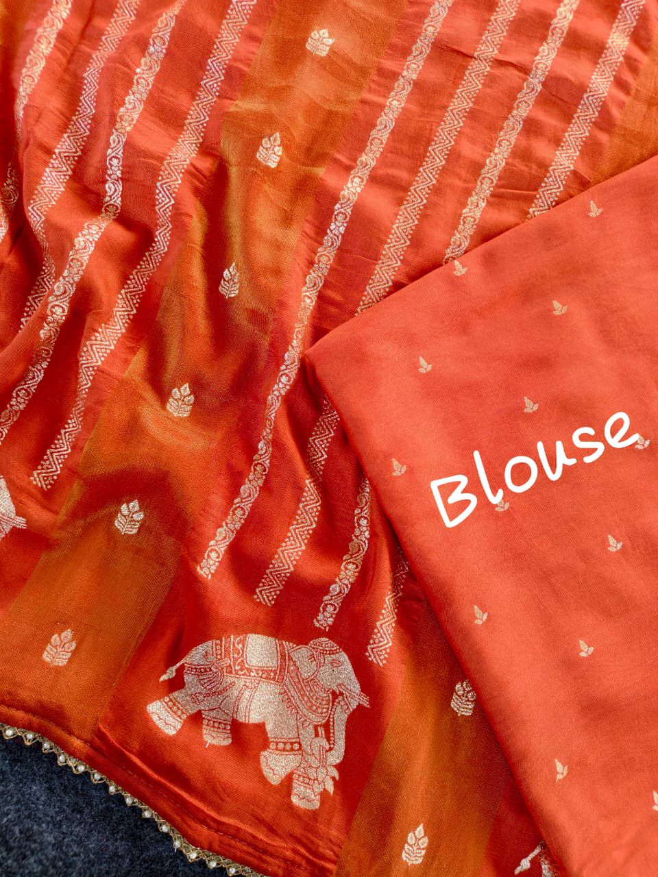 Sizzling Orange Banarasi Georgette Silk Saree With Jubilant Blouse Piece
