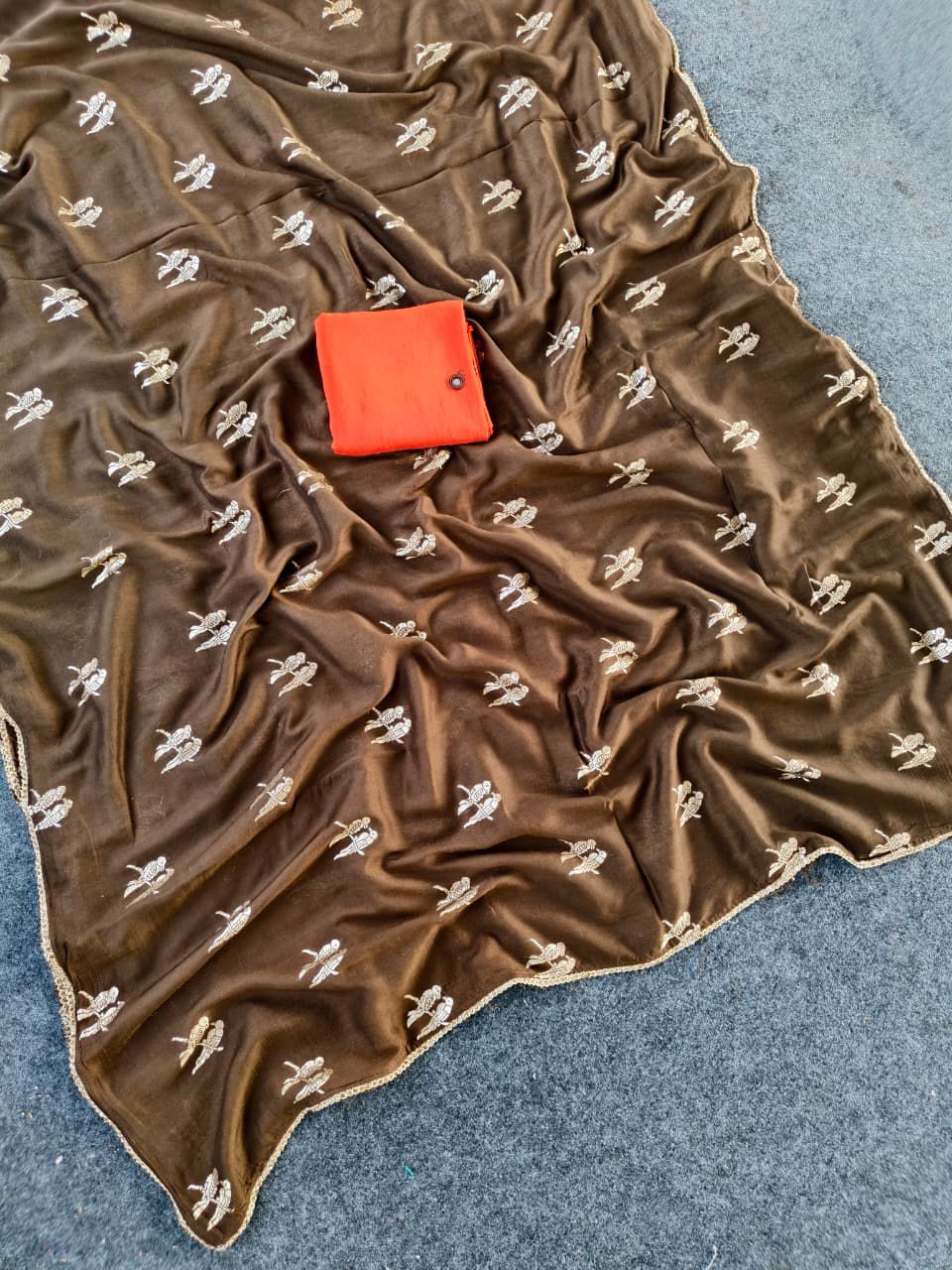 Enchanting Brown Banarasi Georgette Silk Saree With Petrichor Blouse Piece