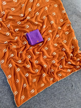Adorning Orange Banarasi Georgette Silk Saree With Enamoring Blouse Piece