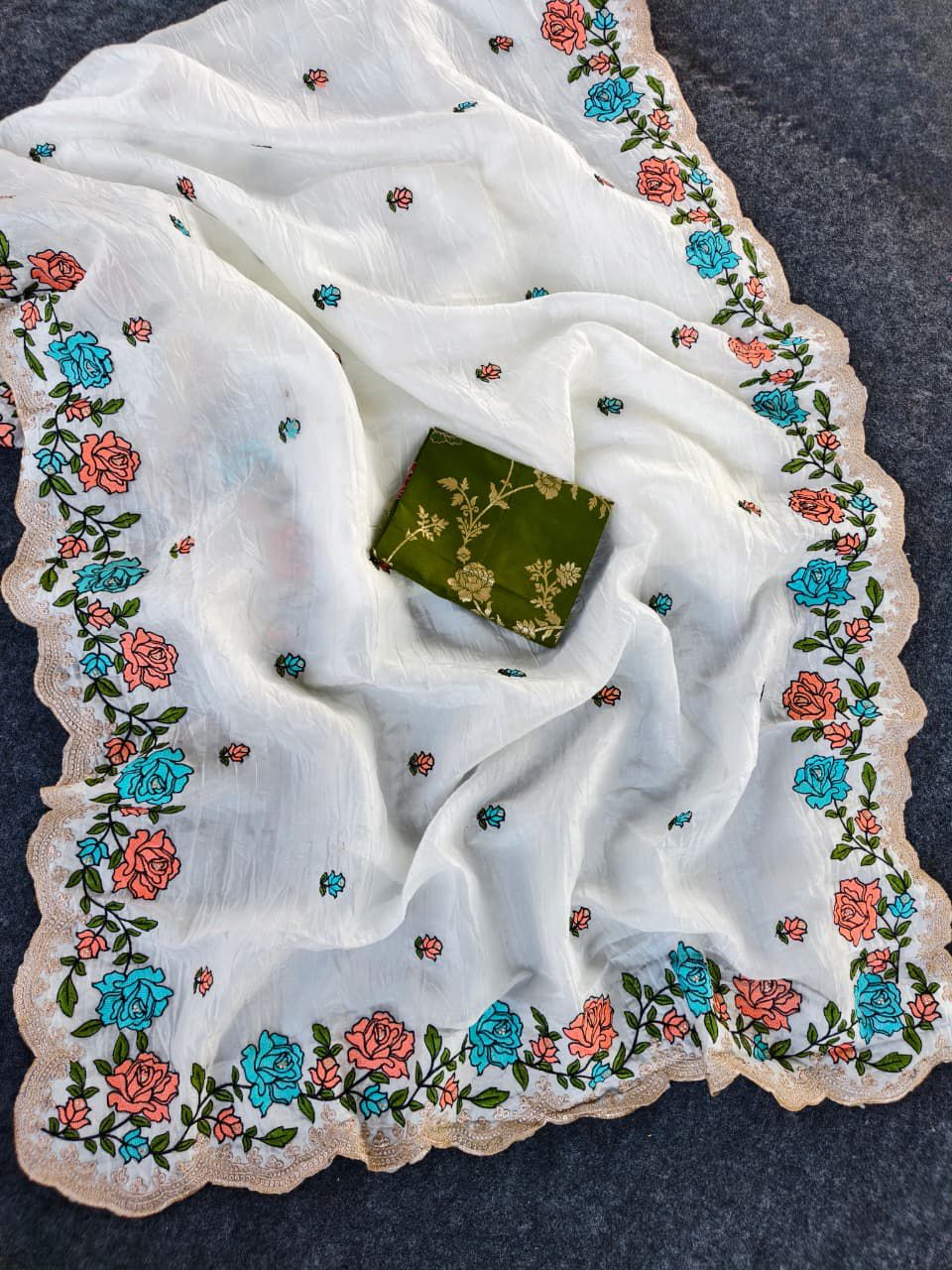 Symmetrical Off White Embroidery Work Crush Silk Saree With Cynosure Blouse Piece