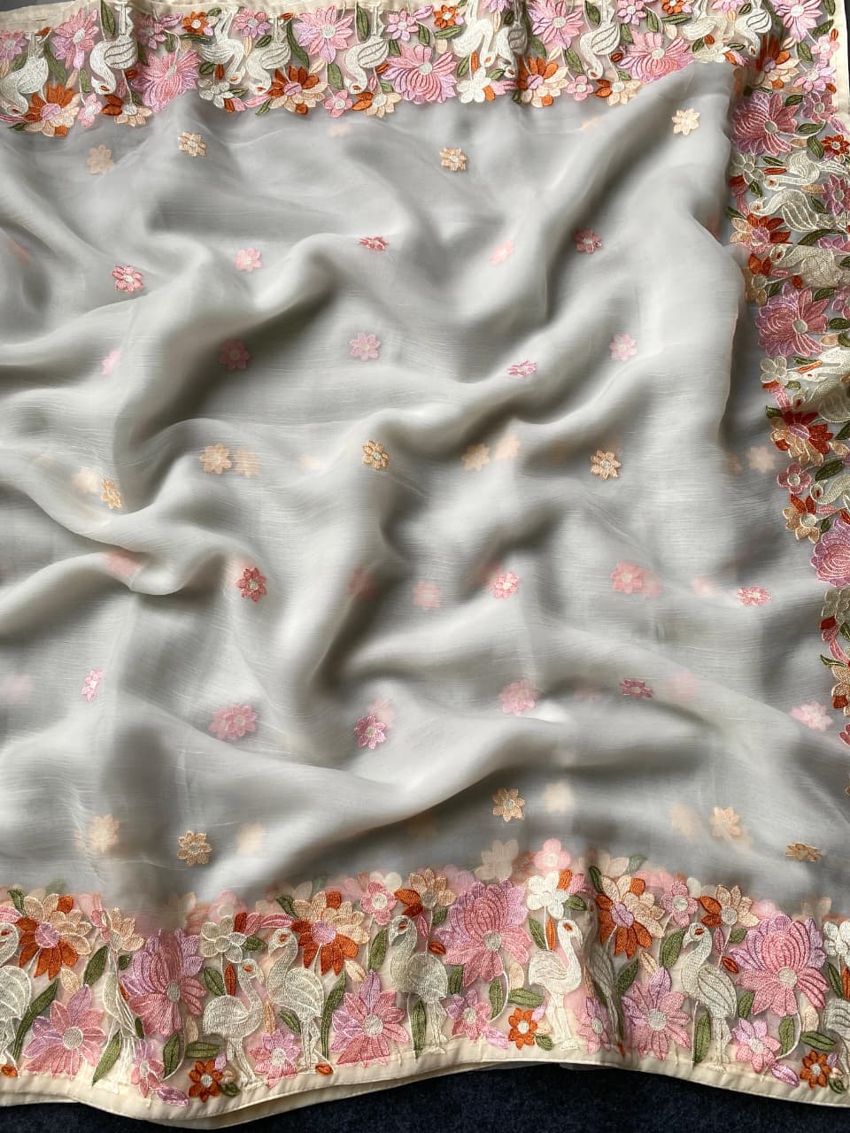 Surpassing Off White Embroidery Work Chiffon Silk Saree With Staring Blouse Piece