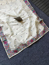 Stunner Off White Embroidery Work Tissue Silk Saree With Smashing Blouse Piece