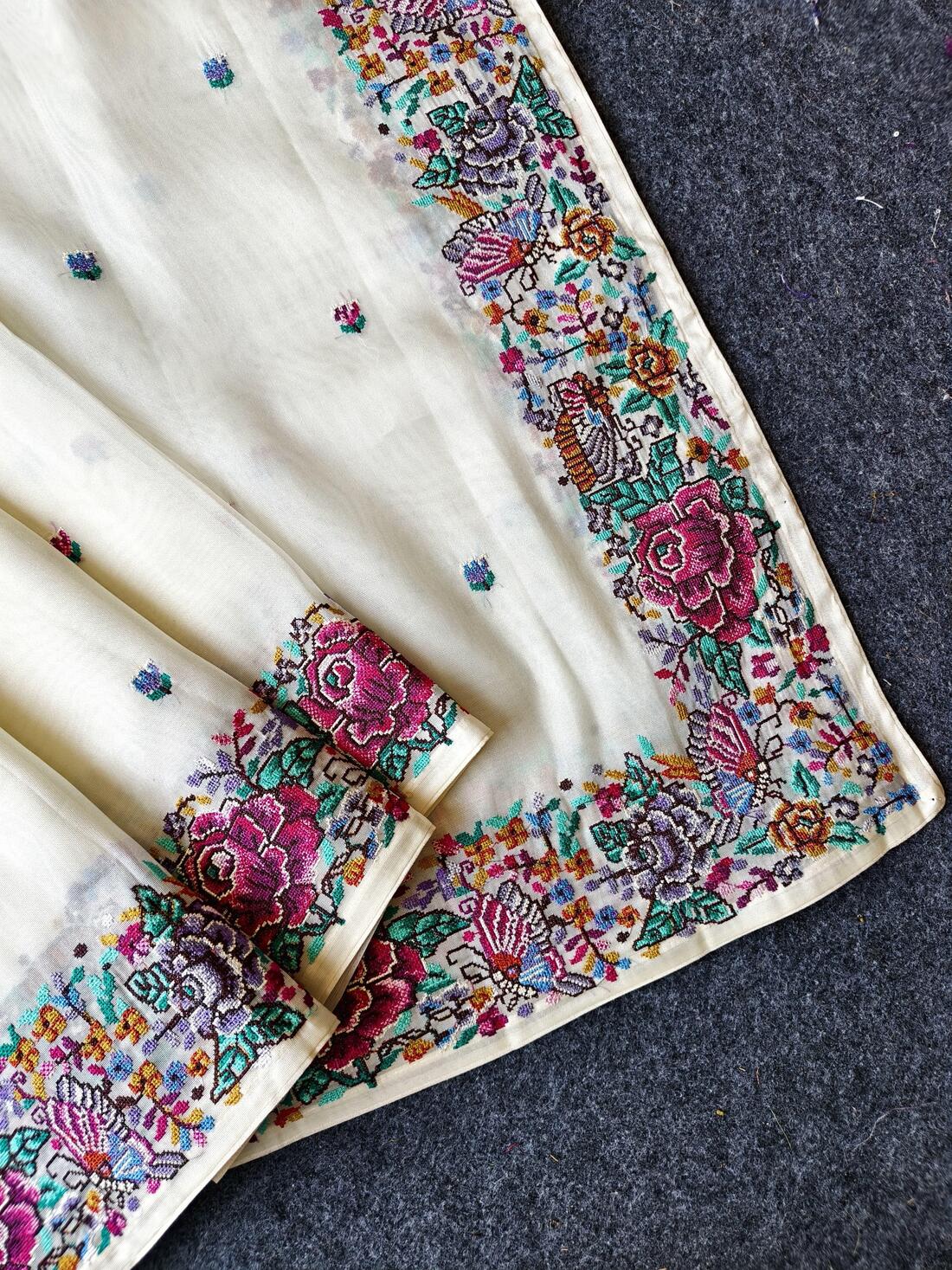 Stunner Off White Embroidery Work Tissue Silk Saree With Smashing Blouse Piece