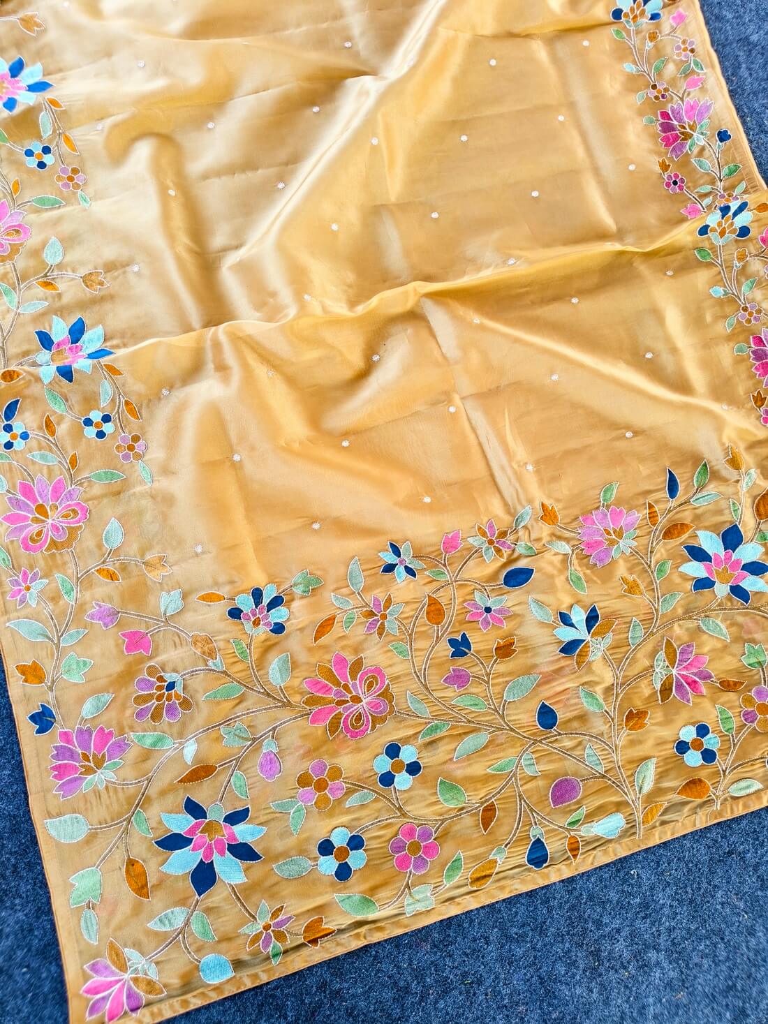 Pleasant Peach Embroidery Work Tissue Silk Saree With Tantalizing Blouse Piece
