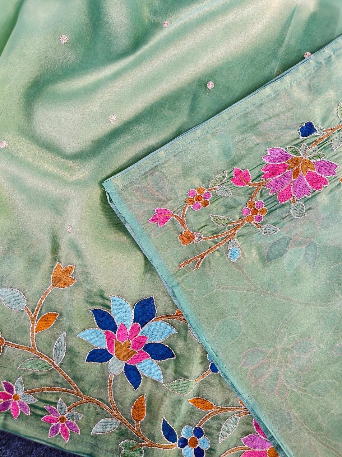 Gossamer Pista Embroidery Work Tissue Silk Saree With Lustrous Blouse Piece