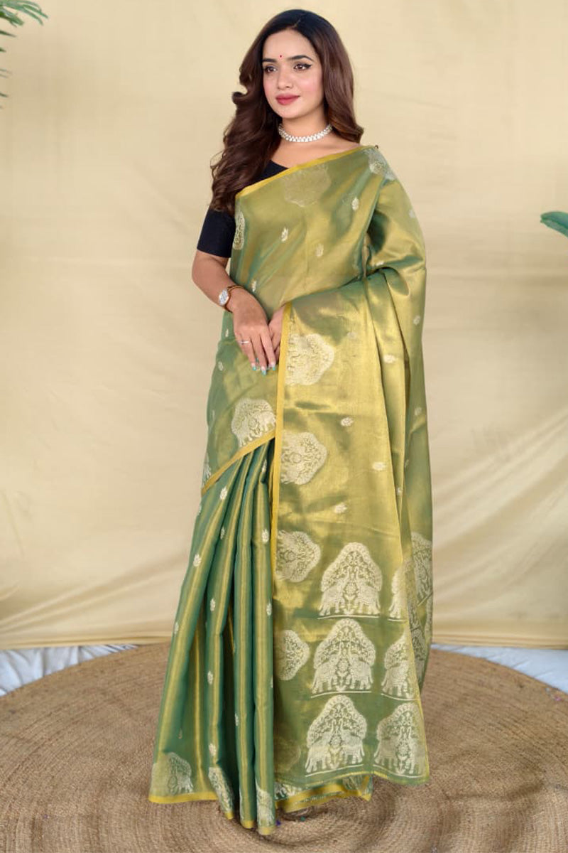 Comely Green Banarasi Tissue Silk Saree With Exceptional Blouse Piece