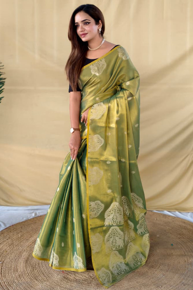 Comely Green Banarasi Tissue Silk Saree With Exceptional Blouse Piece