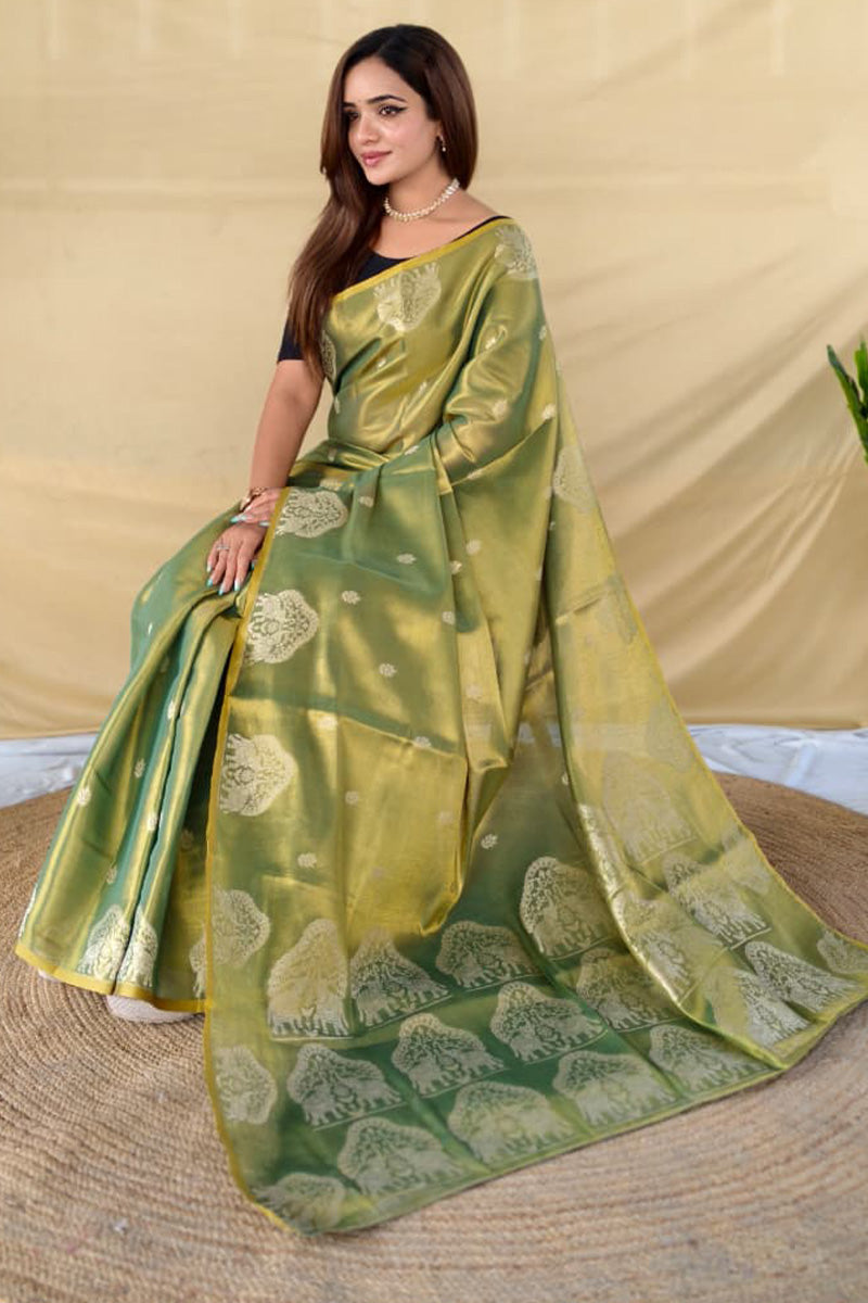 Comely Green Banarasi Tissue Silk Saree With Exceptional Blouse Piece