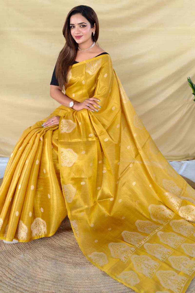 Alluring Yellow Banarasi Tissue Silk Saree With Energetic Blouse Piece