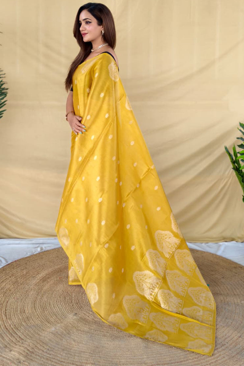Alluring Yellow Banarasi Tissue Silk Saree With Energetic Blouse Piece