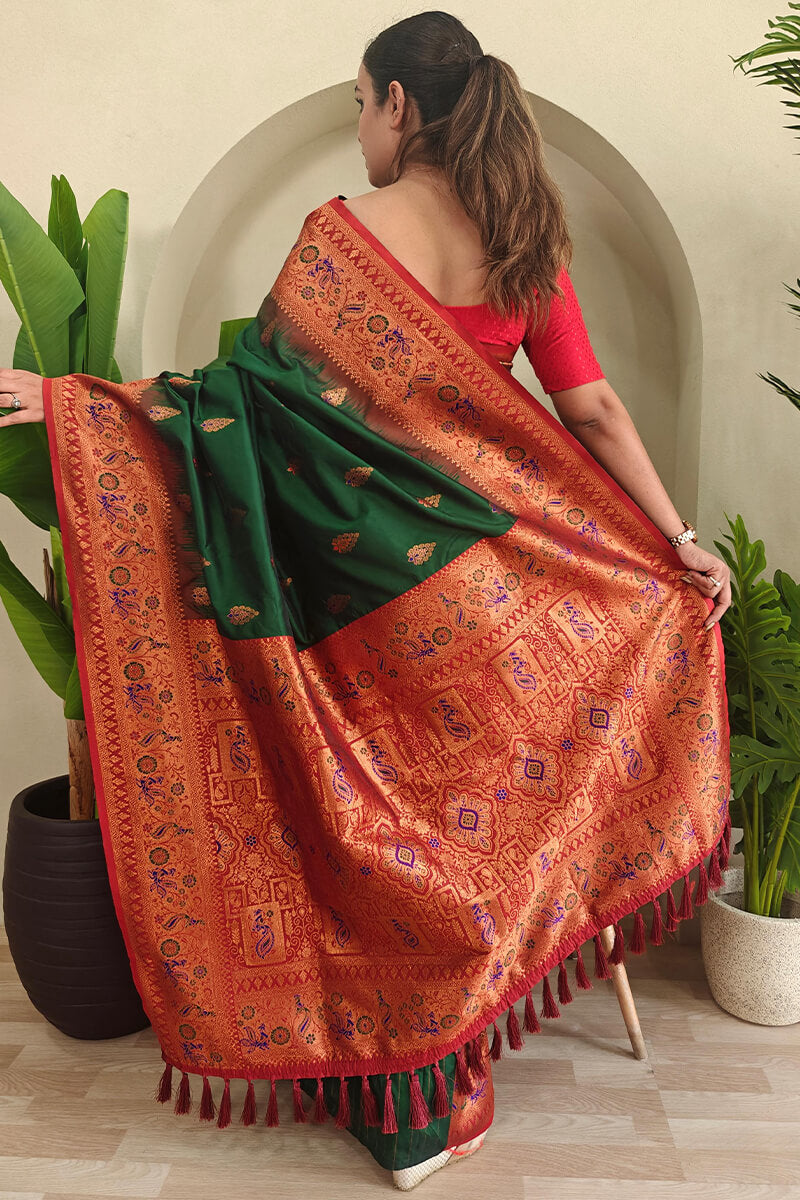 Tempting Dark Green Soft Banarasi Silk Saree With Staggering Blouse Piece