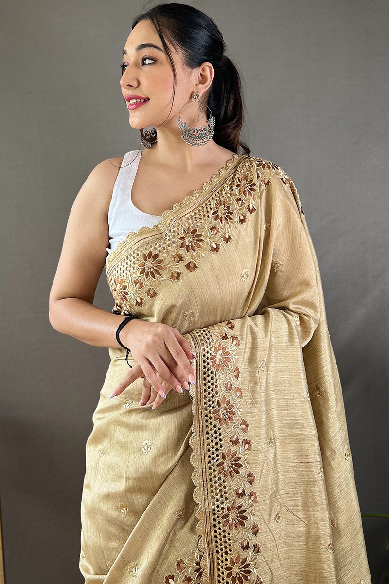 Snazzy Beige Embroidery Work Soft Silk Saree With Improbable Blouse Piece