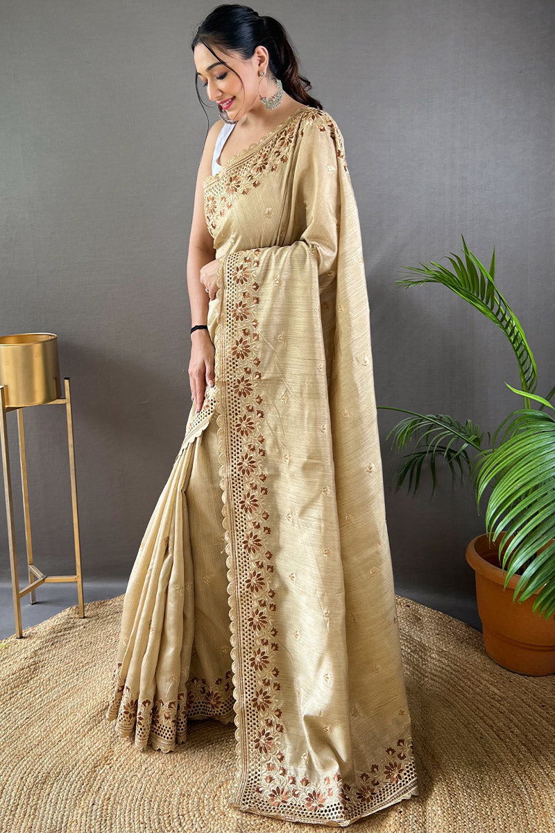 Snazzy Beige Embroidery Work Soft Silk Saree With Improbable Blouse Piece