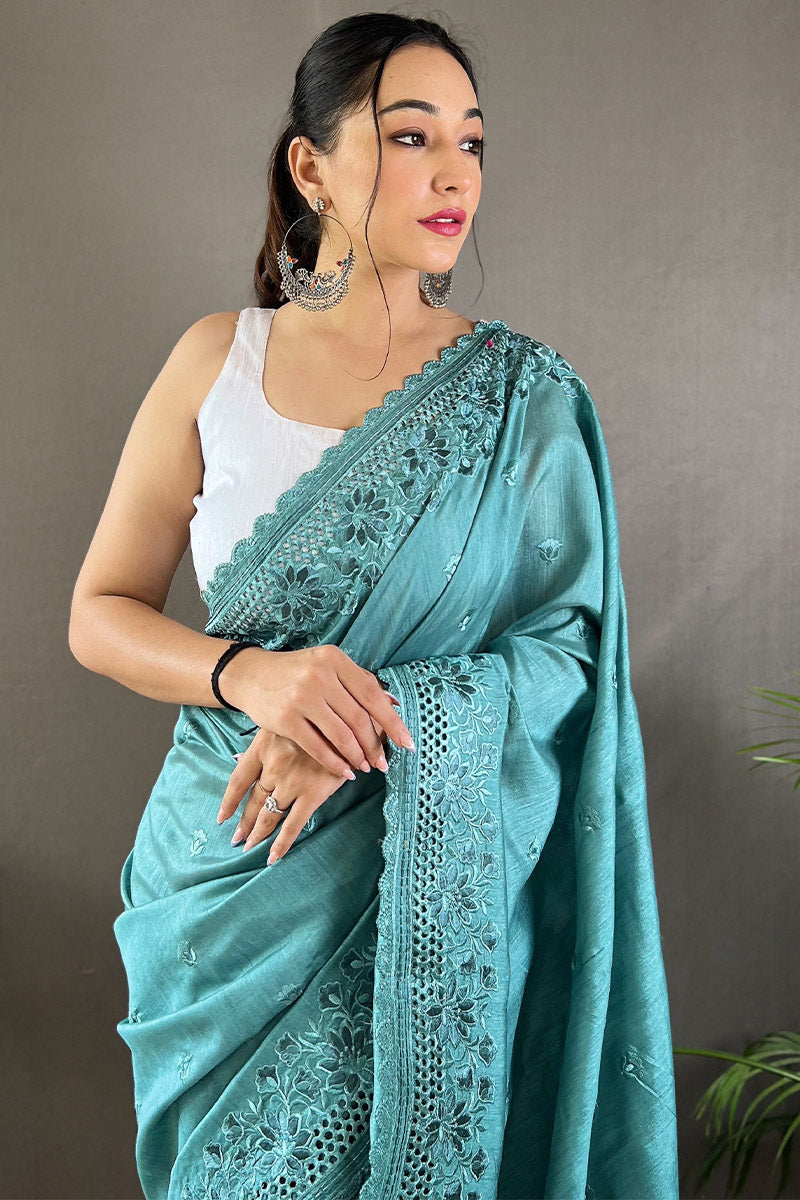 Engaging Firozi Embroidery Work Soft Silk Saree With Luxuriant Blouse Piece