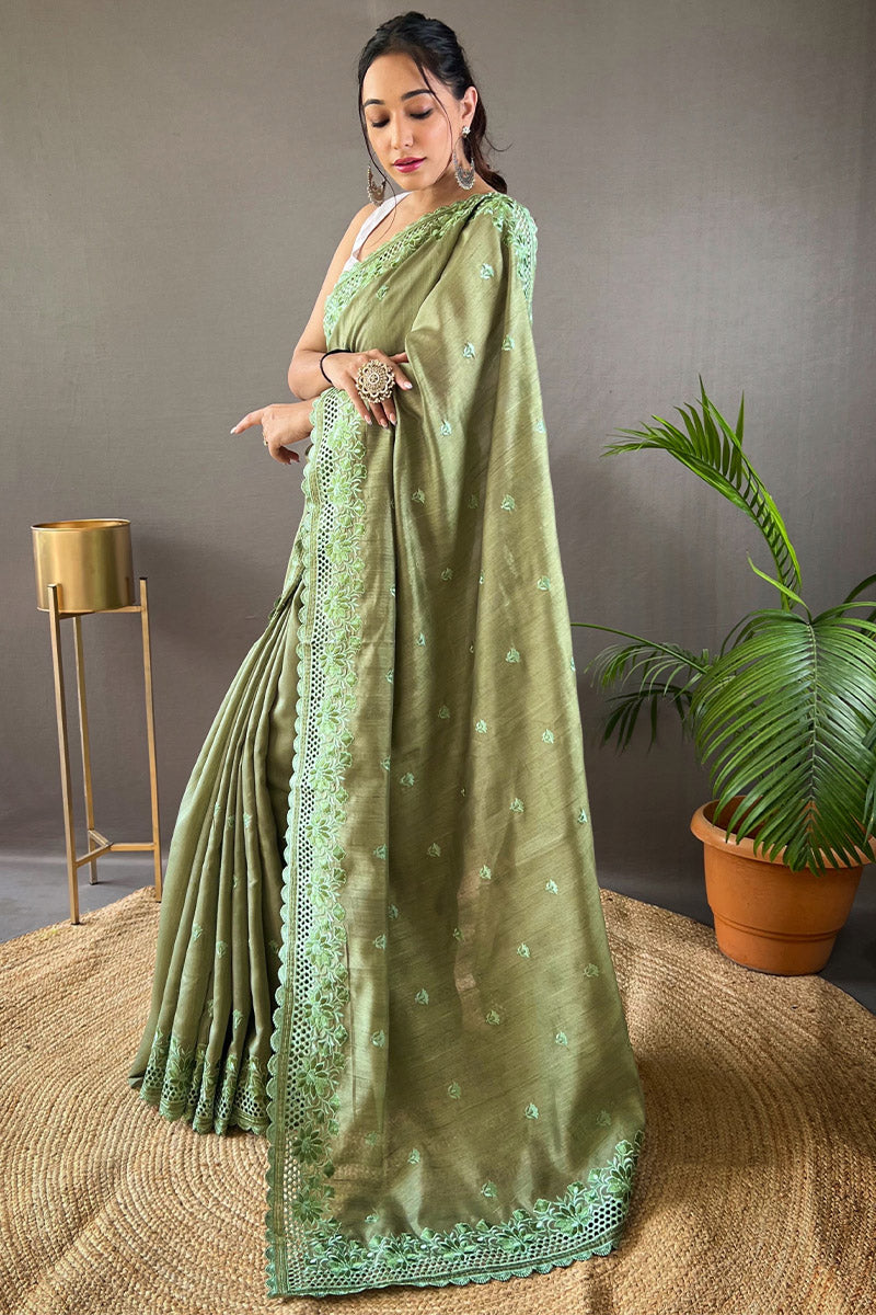 Staggering Green Embroidery Work Soft Silk Saree With Surreptitious Blouse Piece