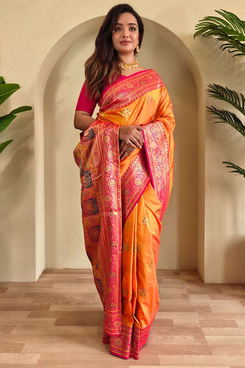 Eloquence Orange Soft Banarasi Silk Saree With Mellifluous Blouse Piece
