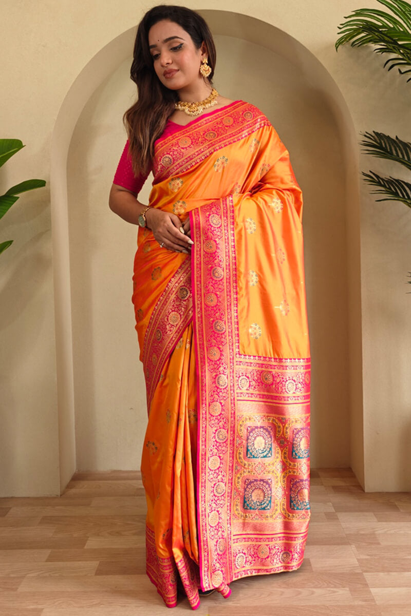 Eloquence Orange Soft Banarasi Silk Saree With Mellifluous Blouse Piece