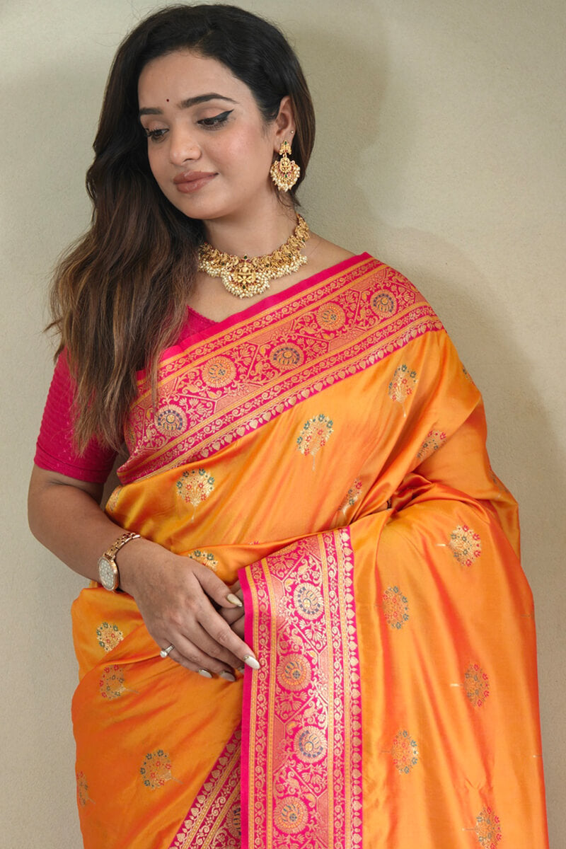 Eloquence Orange Soft Banarasi Silk Saree With Mellifluous Blouse Piece
