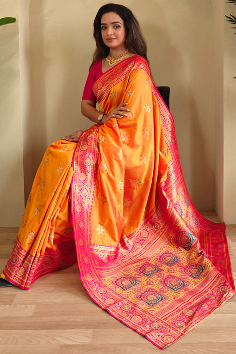 Eloquence Orange Soft Banarasi Silk Saree With Mellifluous Blouse Piece
