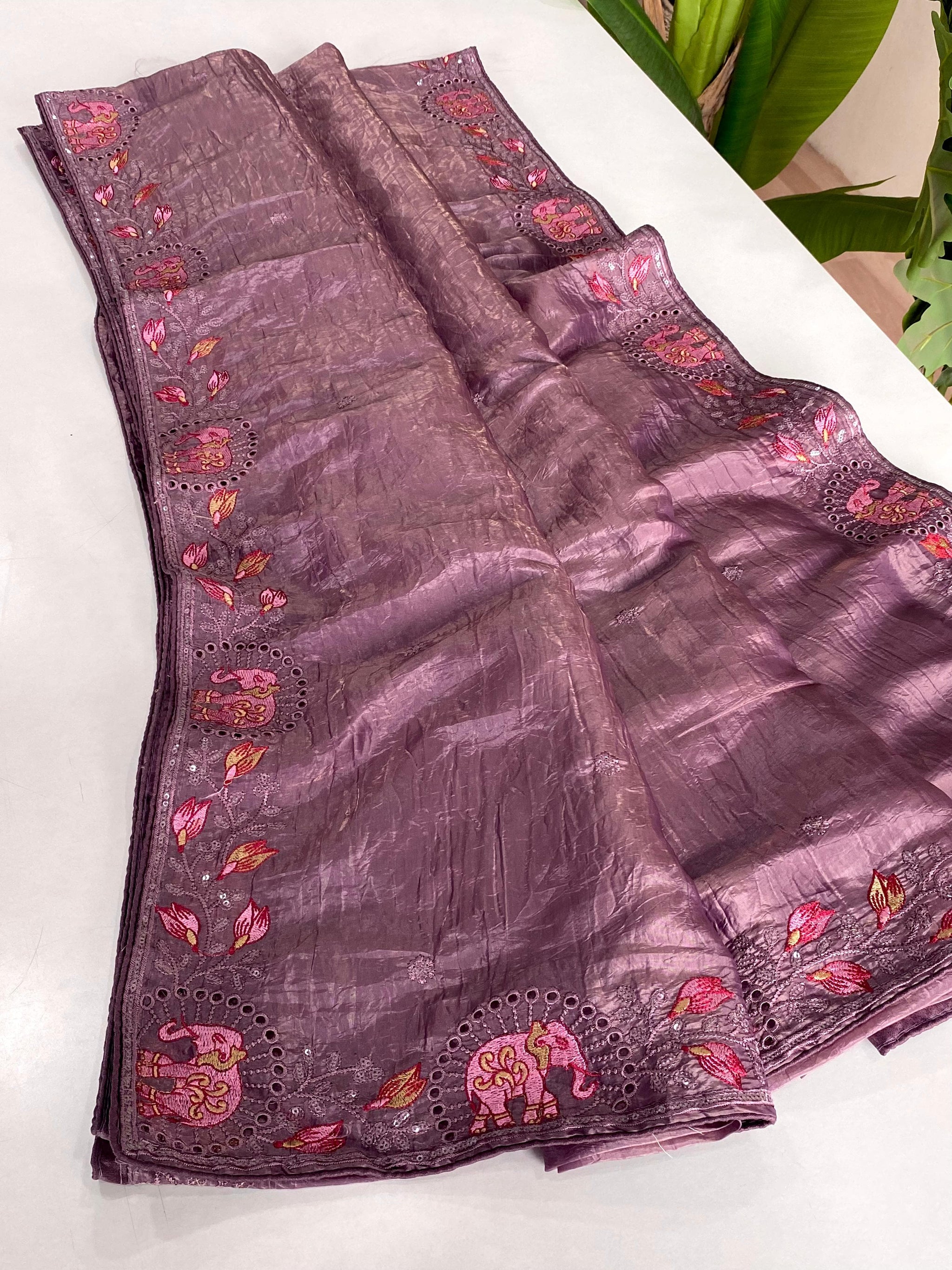 Symmetrical Purple Embroidery Work Crush Silk Saree With Imaginative Blouse Piece