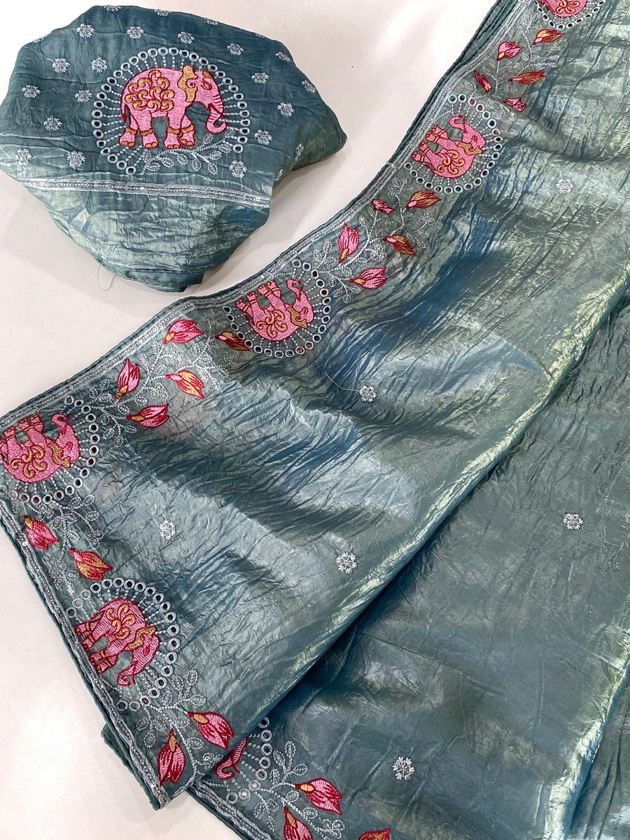 Symmetrical Teal Blue Embroidery Work Crush Silk Saree With Imaginative Blouse Piece