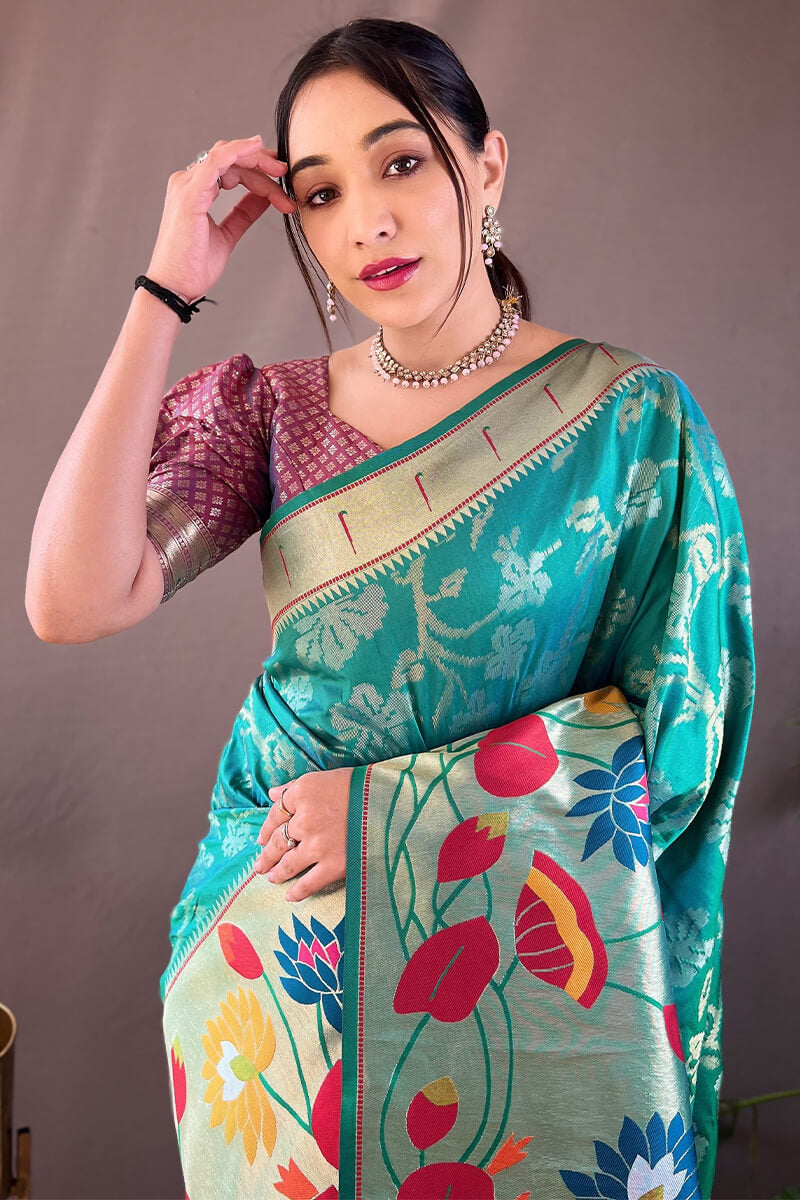 Girlish Rama Paithani Silk Saree With Surpassing Blouse Piece