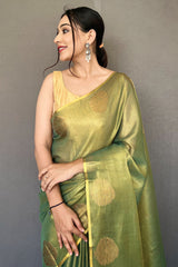 Ineffable Green Soft Banarasi Tissue Silk Saree With Nectarous Blouse Piece