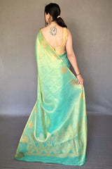 Grandiose Turquoise Soft Banarasi Tissue Silk Saree With Verdant Blouse Piece