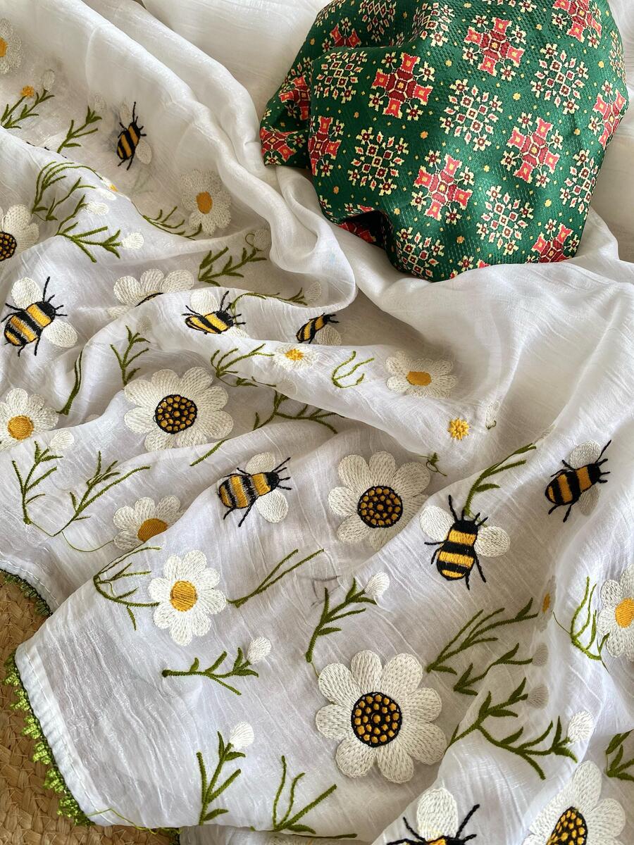 Ephemeral Off White Embroidery Work Crush Silk Saree With Mellifluous Blouse Piece