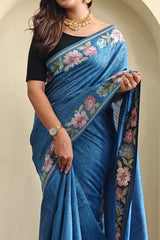 Cynosure Blue Embroidery Work Tussar Silk Saree With Classy Blouse Piece