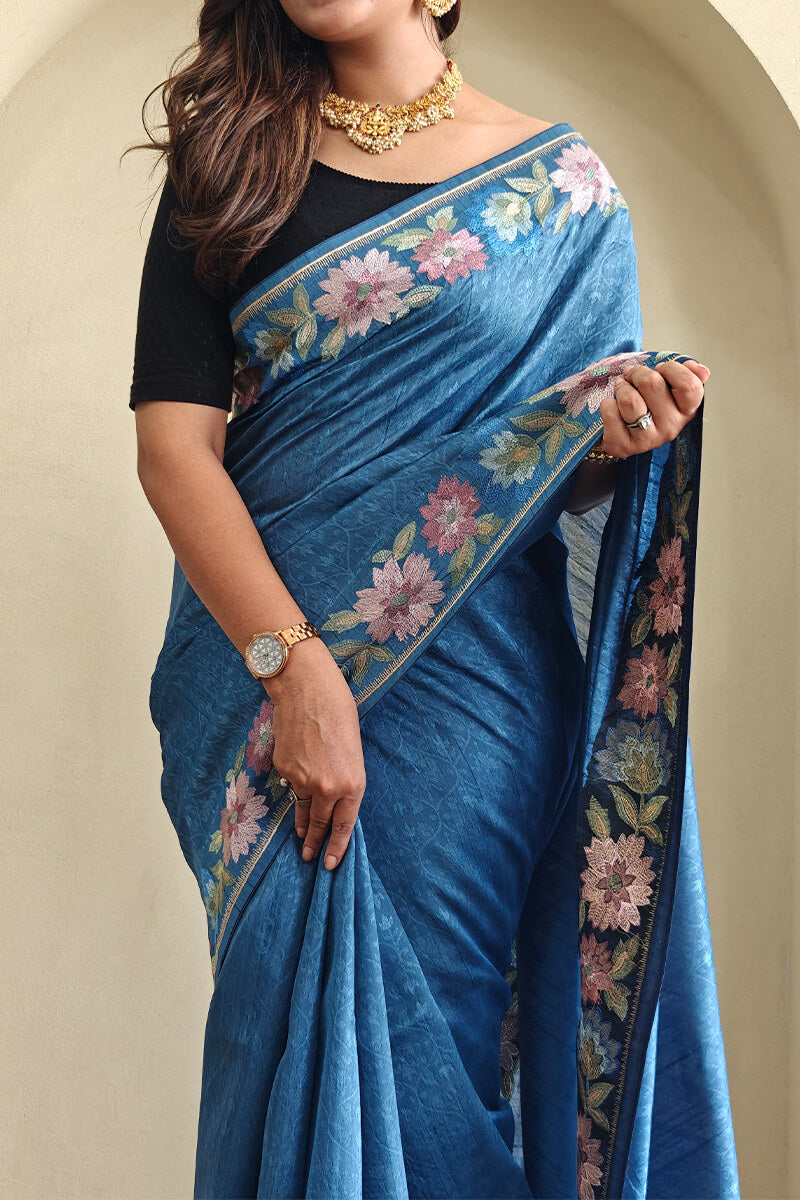 Cynosure Blue Embroidery Work Tussar Silk Saree With Classy Blouse Piece