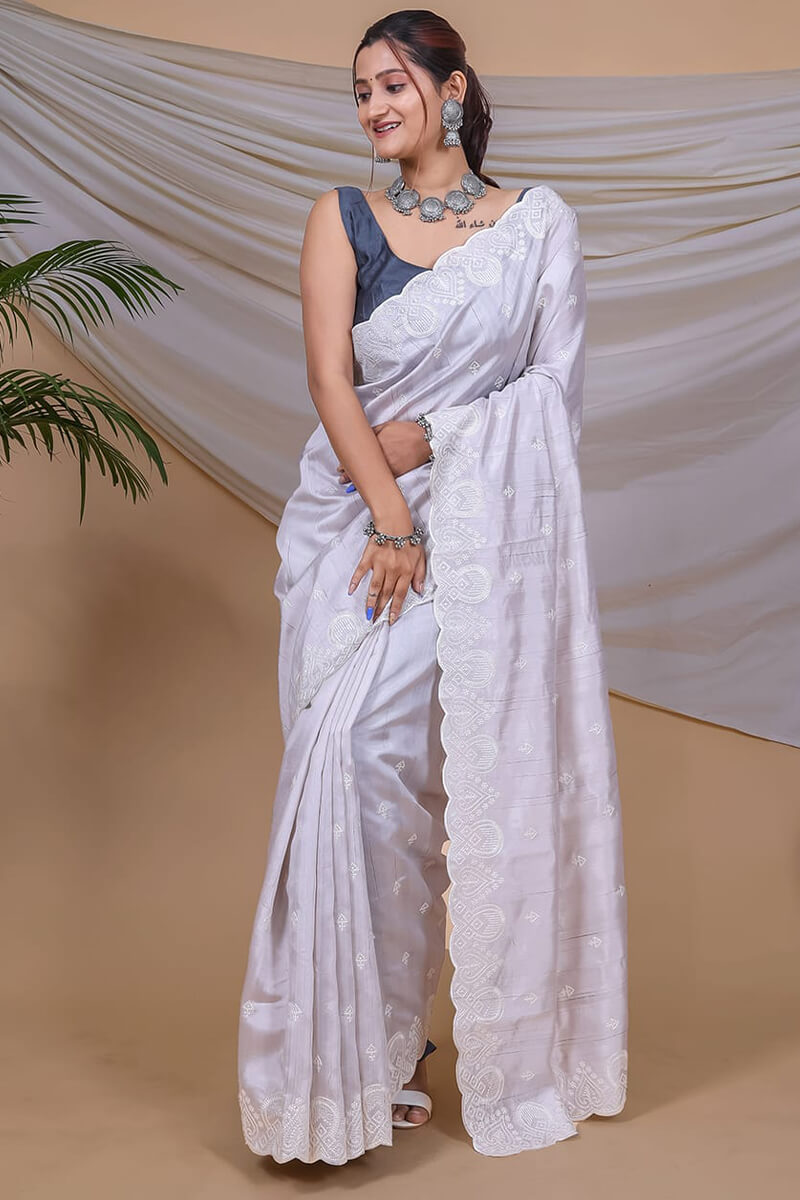 Invaluable Grey Embroidery Work Soft Silk Saree With Girlish Blouse Piece