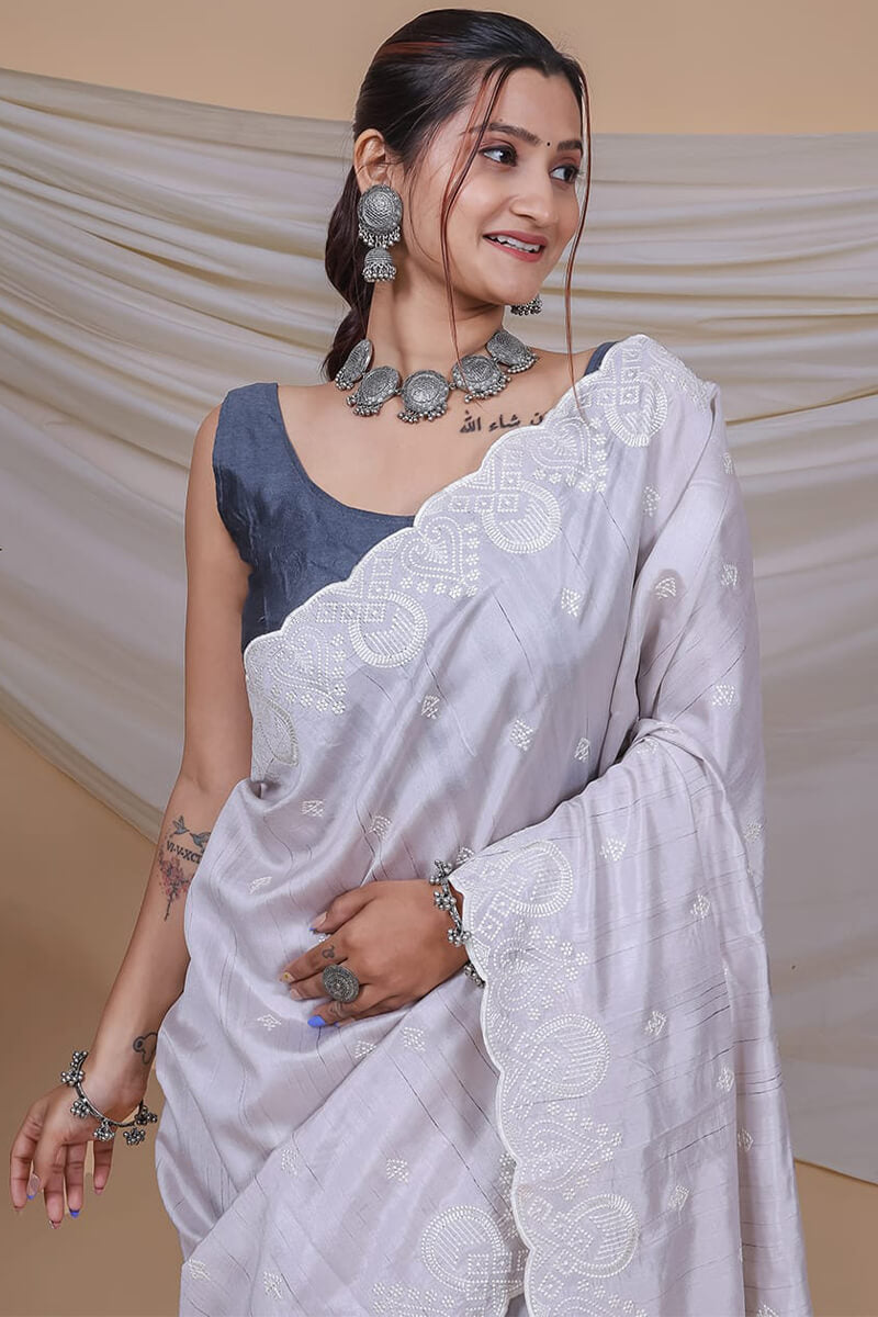 Invaluable Grey Embroidery Work Soft Silk Saree With Girlish Blouse Piece