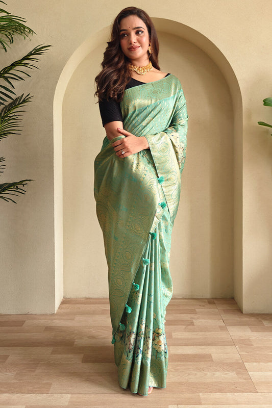 Enigmatic Sea Green Soft Banarasi Silk Saree With Splendorous Blouse Piece