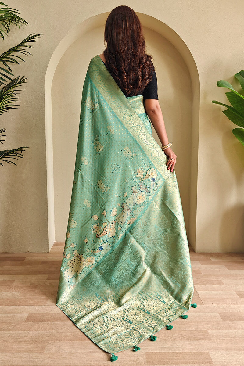 Enigmatic Sea Green Soft Banarasi Silk Saree With Splendorous Blouse Piece