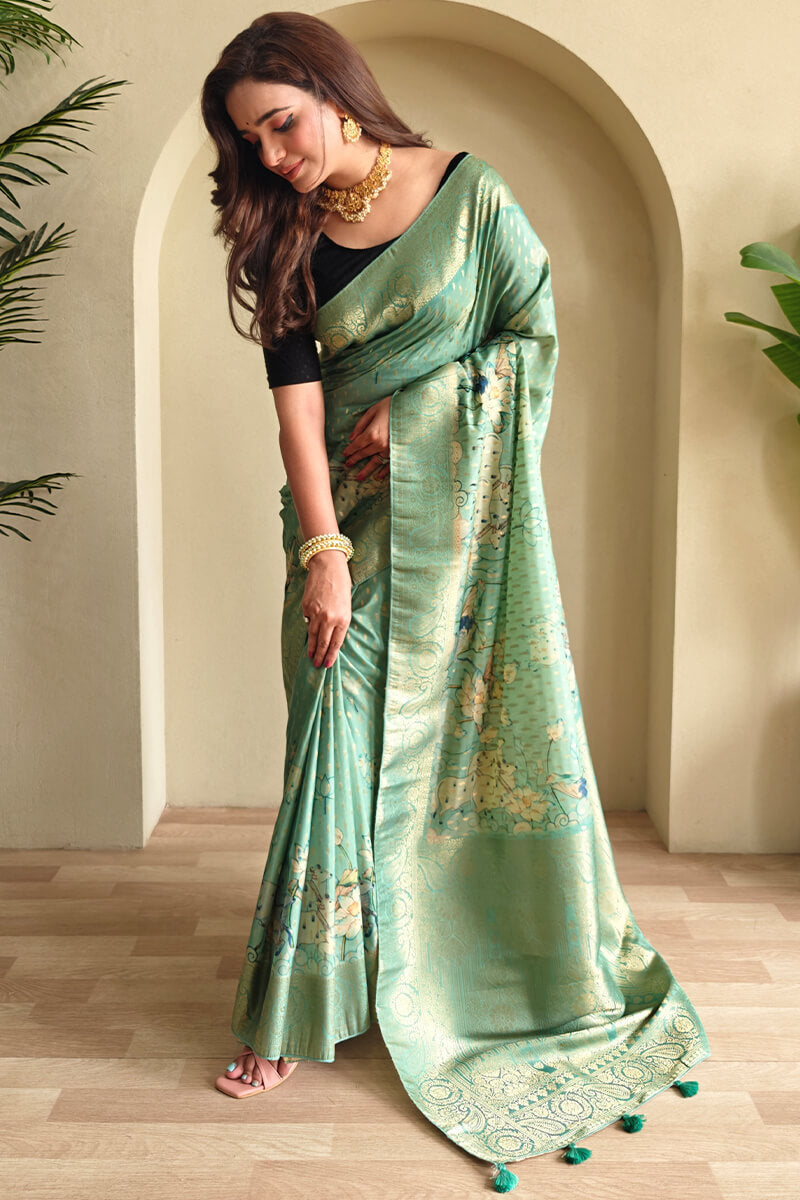 Enigmatic Sea Green Soft Banarasi Silk Saree With Splendorous Blouse Piece