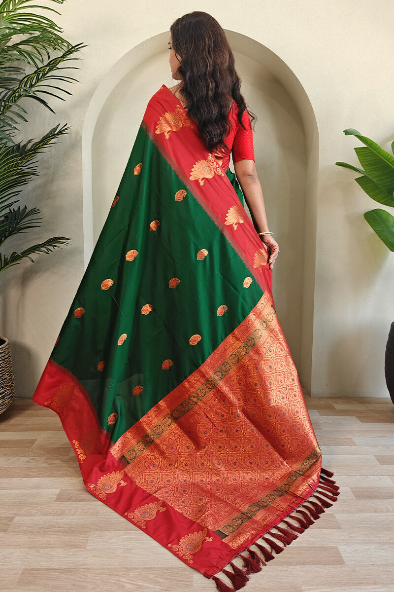 Dalliance Dark Green Soft Banarasi Silk Saree With Jubilant Blouse Piece