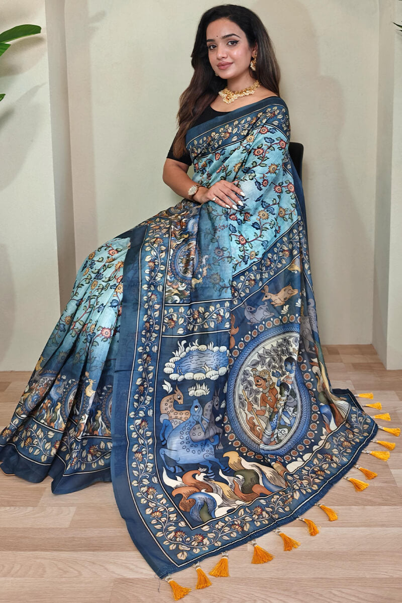 Glamorous Sky Kalamkari Printed Saree With Dulcet Blouse Piece