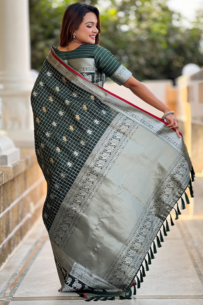 Ephemeral Dark Green Soft Banarasi Silk Saree With Phenomenal Blouse Piece