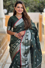 Ephemeral Dark Green Soft Banarasi Silk Saree With Phenomenal Blouse Piece