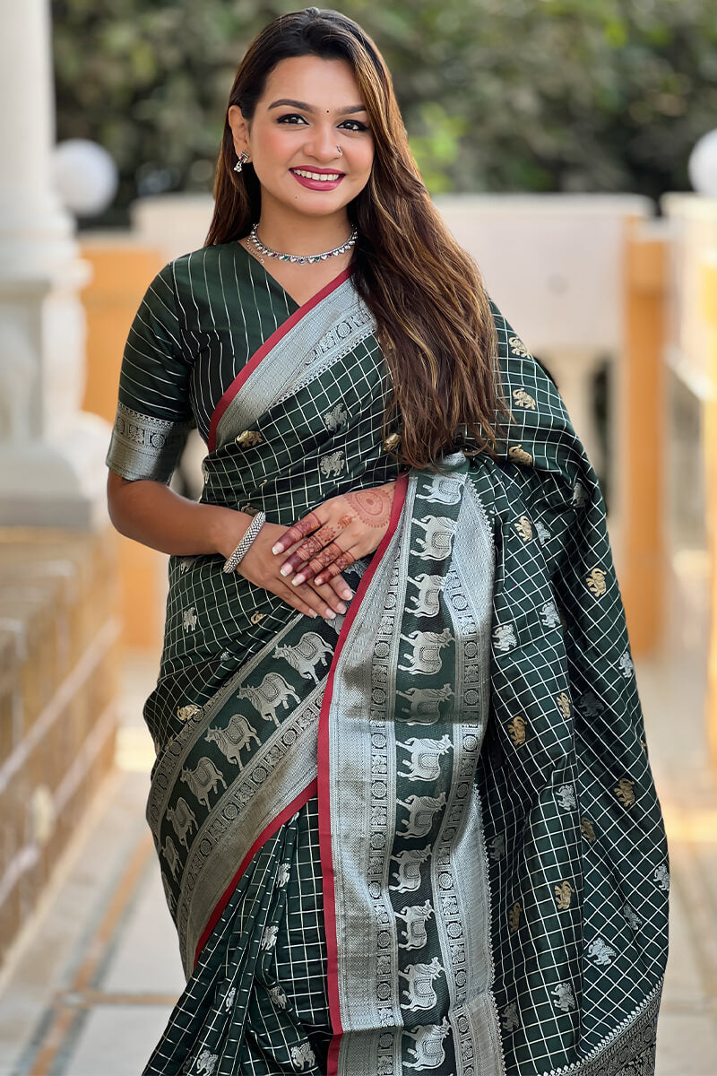 Ephemeral Dark Green Soft Banarasi Silk Saree With Phenomenal Blouse Piece
