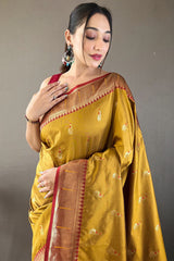 Flattering Mustard Paithani Silk Saree With Adorning Blouse Piece